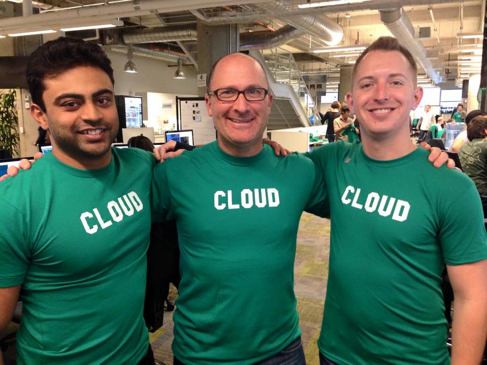 Three Pivotal engineers in matching green 'CLOUD' t-shirts at the Pivotal Software office: Amit Gupta, Matt Reider, and Matt Royal.